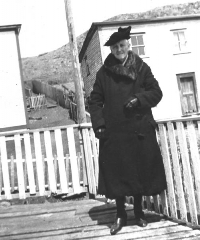 116: Mrs. Stasia Dunphy on the family porch. Bill Webber's house at right; John Carroll's  house at left. (circa 1945) [courtesy of Mollie McCarthy]
